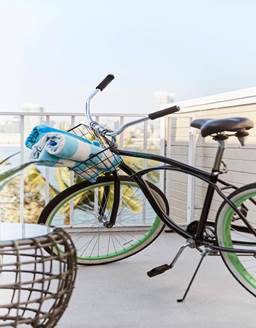 A bicycle parked on the side

Description automatically generated