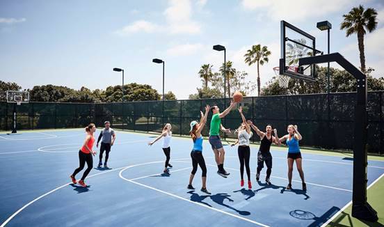 A group of people on a court

Description automatically generated